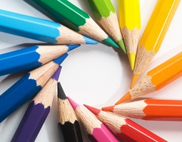 Email Branding - Perfecting The Art 3 A close-up of sharpened pencil tips, arranged in a circular rainbow.