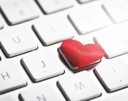 Get ready to fall in love with email (all over again) 10 A close up of a keyboard with a red heart on one key.