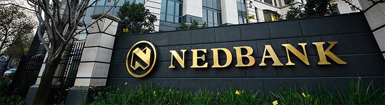 Nedbank-email-banner-750 The gates outside of Nedbank, with the company logo written in gold on a black wall.