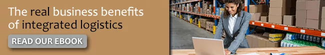 The-real-business-benefits-of-integrated-logistics An email banner with the message "The real business benefits of integrated logistics READ OUR EBOOK" next to a photo of a woman typing on a laptop in a fulfillment centre.