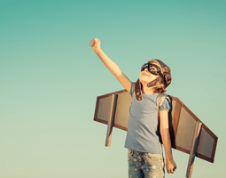 You’ve got a great business. So why haven’t you got a great email signature? 11 A child wearing a flying hat and goggles and strapped on plane wings makes a fist and looks up at the sky.